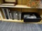 SHELF LOT; INCLUDES A BLACK WASH BASIN, PLASTIC BOTTLES, STEEL ORGANIZERS, ETC.