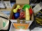 BOX LOT OF DOG TOYS; INCLUDES TENNIS BALLS, RUBBER BONES, PLUSH DOGGIE CHEW TOYS, AND MORE!
