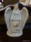 PORCELAIN ANGEL FIGURINE; WHITE AND GOLD TONED PORCELAIN ANGEL FIGURINE WITH 2 SMALL CHILDREN.