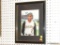 FRAMED PHOTOGRAPH; THIS PHOTOGRAPH IS OF ONE OF THE PITTSBURGH PIRATES. HAS BLACK MATTING AND IN A