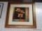 LARGE FLORAL STILL LIFE IN GOLD COLORED FRAME; SHOWS A GROUP OF BRIGHTLY COLORED FLOWERS WITH