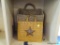 2 BASKET LOT; INCLUDES A WICKER WALL HANGING BASKET AND A WOVEN STAR THEMED WALL HANGING BASKET.
