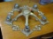 VINTAGE LIGHT FIXTURE; HAS 5 LIGHT HOLDING CAPABILITIES AND IS FLUSH MOUNTED. HAS SCROLLING DETAILS