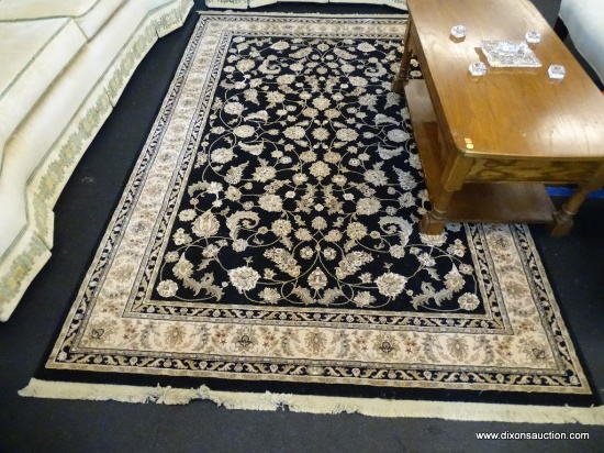 KARASTAN AREA RUG; PERSIAN RENAISSANCE #39 AREA RUG IN BLACK, CREAM AND GREEN. MEASURES 5 FT 3 IN X