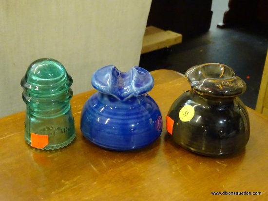 LOT OF 3 INSULATORS; 1 BROWN IN COLOR AND IS MADE BY THOMAS, 1 IS MADE BY HEMINGRAY, AND 1 COBALT IN