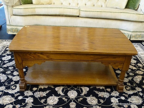 COFFEE TABLE; OAK COFFEE TABLE WITH 1 LOWER SHELF AND EXTENDABLE TOP FOR EASE OF ACCESS TO REMOTES,
