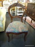 BALLOON BACK CHAIR; MAHOGANY BALLOON BACK SIDE CHAIR WITH FRUIT CARVING AND PAISLEY UPHOLSTERED