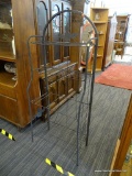 BAKERS RACK; 4 SHELF BLACK METAL FOLDING BAKERS RACK. MEASURES 24 IN X 13 IN X 60 IN