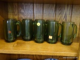 GREEN GLASS MUGS; INCLUDES 9 TOTAL MUGS. ALL ARE IN EXCELLENT CONDITION.