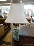 TABLE LAMP; 1 OF A PAIR OF GREEN FLORAL TABLE LAMPS WITH WHITE RECTANGULAR SHADES AND BRASS FINIALS.