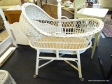 BABY BASSINET; WICKER BASSINET WITH WOODEN INNER BOTTOM AND WICKER BASE ON WHEELS. TOP IS REMOVABLE.