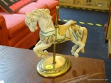 WILLITTS DESIGNS CAROUSEL HORSE FIGURINE; MOUNTED ON A BRASS BASE AND MEASURES 8 IN TALL