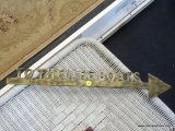 BRASS SIGN; READS TO THE LIFEBOATS. IS MADE OF SOLID BRASS AND MEASURES 25 IN LONG.