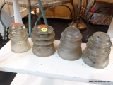 LOT OF CLEAR GLASS INSULATORS; INCLUDES 4 TOTAL PIECES AND ARE IN VERY GOOD CONDITION!