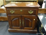 NIGHT STAND; PENNSYLVANIA HOUSE 1 DRAWER OVER 2 DOOR CHERRY NIGHTSTAND WITH BRASS HARDWARE. MEASURES