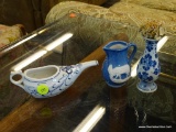 3 PIECE LOT; INCLUDES A DELFT BUD VASE, A BLUE AND WHITE FLORAL PATTERN SINGLE HANDLED WATER POURER,