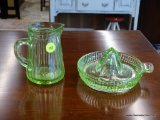 URANIUM GLASS LOT; INCLUDES A HAND JUICER AND A CREAMER. BOTH ARE IN EXCELLENT CONDITION!