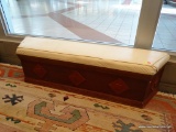 HALL BENCH; BURGUNDY PAINTED WITH DIAMOND PATTERN ON THE FRONT AND SIDES WITH A CREAM COLORED