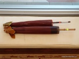PAIR OF VINTAGE JAPANESE UMBRELLAS; MADE OF RICE PAPER AND BAMBOO. 1 MEASURES 26 IN LONG WITH NO