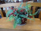 ARTIFICIAL FLOWER ARRANGEMENT; HAS ARTIFICIAL FERNS, BERRIES, AND RED BUDDING FLOWERS ALL WITHIN A