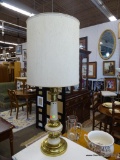 TABLE LAMP; 1 OF A PAIR OF GOLD AND CREAM TONED TABLE LAMPS WITH TALL ROUND SHADES AND BRASS