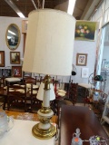 TABLE LAMP; 1 OF A PAIR OF GOLD AND CREAM TONED TABLE LAMPS WITH TALL ROUND SHADES AND BRASS