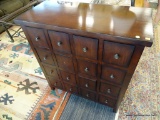 16 DRAWER STORAGE CABINET; MAHOGANY CABINET WITH SILVER TONED PULLS. MEASURES 35 IN X 16 IN X 38 IN