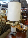VINTAGE TABLE LAMP; CREAM AND ORANGE GLASS TABLE LAMP WITH BRASS FIXTURES AND A CREAM BARREL SHADE