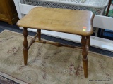 WHITNEY STOOL; RECTANGULAR TOP STOOL WITH ROUNDED CORNERS AND CURVED SIDES. SITS ON FOUR SLANTED