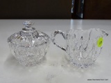 CUT GLASS SUGAR AND CREAMER; HATCHED CUT HANDLED CREAMER WITH MATCHING SUGAR BOWL WITHOUT LID.