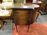 VINTAGE SEWING TABLE; DARK WOOD SEWING TABLE WITH ONE DEMI LUNE SIDE, AND THREE DRAWERS ON FRONT.