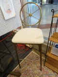 BRUSHED GOLD AND CREAM BAR STOOL; BAR STOOL WITH A BRUSHED GOLD FRAME AND CREAM CUSHIONED SEAT.
