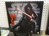 STAR WARS CANVAS; THIS CANVAS FEATURES KYLO REN FROM THE STAR WARS SERIES. THE CANVAS READS 