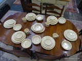 FIESTAWARE DINING SET; THIS 53 PIECE YELLOW FIESTAWARE SET INCLUDES: 10 DINNER PLATES, 10 LUNCH