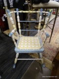 CHILD'S ROCKER; BLUE, YELLOW, AND WHITE ROCKER WITH SPINDLED BACK AND QUILTED DESIGN SEAT. PIECE IS