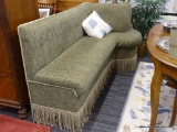DESIGNER BENCH; CUSTOM MADE DESIGNER BENCH WITH GREEN AND BEIGE UPHOLSTERY WITH TASSELED BASE. WOULD