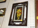 FRAMED NEEDLEWORK CHINESE DRAGON; THIS NEEDLEWORK PIECE FEATURES A GOLD, RED, AND WHITE DRAGON,