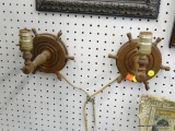 SHIP WHEELS WALL SCONCES; PAIR OF BROWN WALL SCONCES IN THE SHAPE OF SHIP WHEELS. MEASURE 8 IN X 7