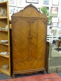 VINTAGE ARMOIRE; BEAUTIFUL VINTAGE ARMOIRE WITH WOOD PARQUET DOORS FEATURING SCROLL DESIGNS ON THE