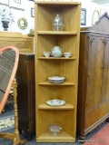 WOODEN CORNER SHELVING UNIT; STURDY LIGHT COLORED WOOD GRAIN CORNER UNIT WITH 4 SHELVES. THE 2