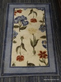 SMALL RUG RUNNER; LOW PILE WOOL RUNNER RUG WITH MAROON, BLUE, CREAM, AND GREEN FLORAL DESIGN INSIDE