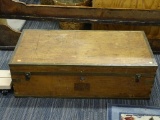 VINTAGE TRUNK; LIGHT WOOD, FELT LINED TRUNK WITH BRASS FIXTURES. MEASURES 38 IN X 18.5 IN X 12 IN.