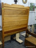 FULL SIZE BED FRAME; FULL SIZE BED FRAME WITH EXTRA HIGH HEADBOARD AND WOOD RAILS. MEASURES 54.5 IN
