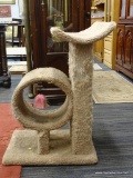 CAT TREE; MULTI-TIERED, BEIGE CAT TREE WITH A CYLINDER ON THE LOWER TIER AND A CONCAVE PLATFORM ON