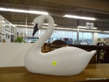 SWAN SCULPTURE; CRAFTED FROM WOOD. HAS A FEW CRACKS WHERE IT APPEARS TO HAVE BEEN REPAIRED. MEASURES