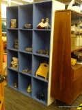 TWELVE CUBE SHELF; LIGHT BLUE AND WHITE PAINTED SHELF, CONTAINING TWELVE STORAGE CUBES. MEASURES 48