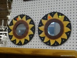 SET OF HAND PAINTED WALL MIRRORS; SET OF 2 ROUND MIRRORS, EACH IS POSITIONED IN THE CENTER OF A HAND