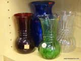 SET OF GLASS VASES; SET OF 4 DIFFERENT COLORED GLASS VASES. ONE IS A LARGE BLUE GLASS VASE AND
