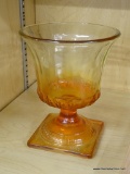 VINTAGE GLASS PEDESTAL DISH; PEACH COLORED PRESSED GLASS FLUTED PEDESTAL DISH. STAMPED 