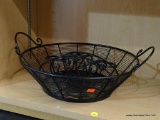 2 PIECE LOT; INCLUDES A A METAL AND WIRE BASKET AND A METAL CANDLE HOLDER